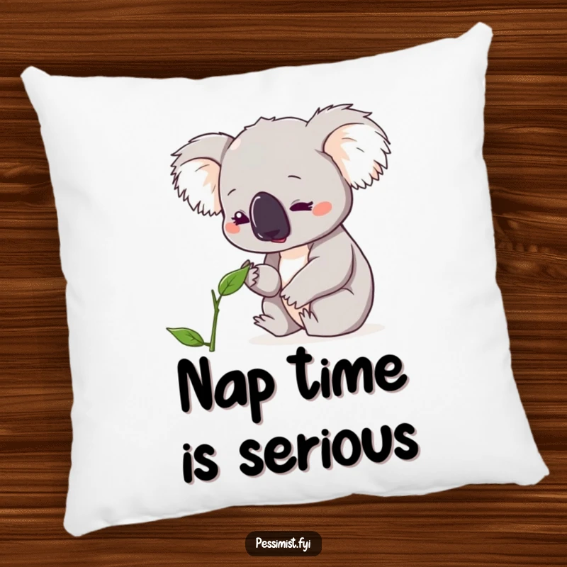Funny koala pillow showing a cute character looking down with concern at a single, wilting leaf, perfect for cozy, humorous decor.